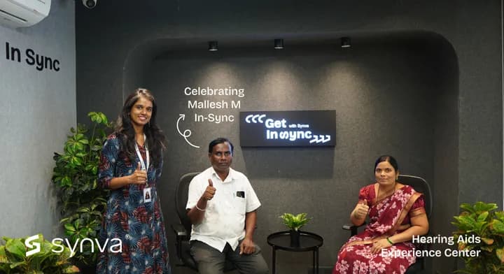 Mallesh M, celebrating their new hearing at Synva's Hyderabad Experience Centre