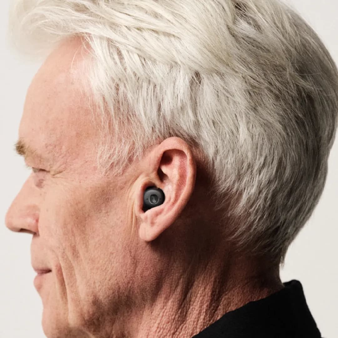 Inside the canal hearing aids (ITC) worn by a person, cosmetic view shows of how the hearing aid is fitting